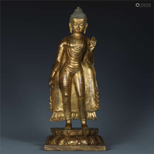 A Chinese Gilt Bronze Standing Figure of Sakyamuni
