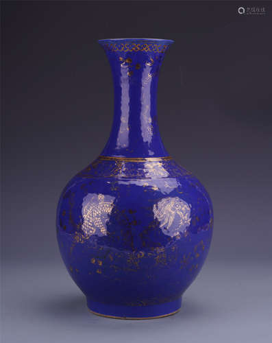 A Chinese Blue-glazed Gilt-decorated 'Dragon' Bottle Vase