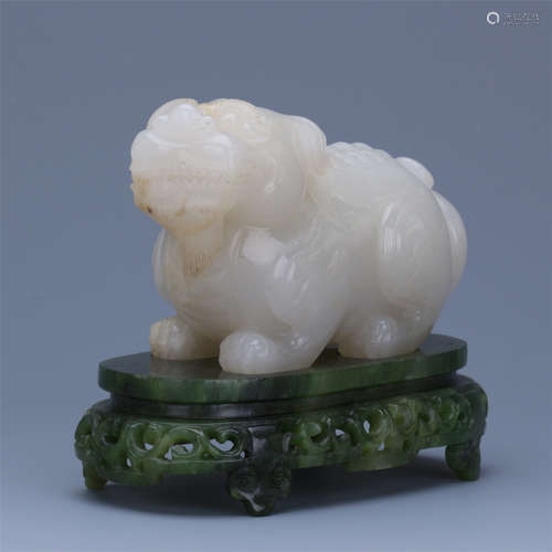 A Chinese White Jade 'Beast' Carving