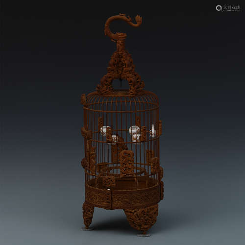 A Carved Chinese Bamboo Cage  with Dragon Motif