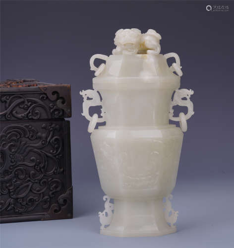 A Chinese White Jade  Vase Incised  Taotie Mask