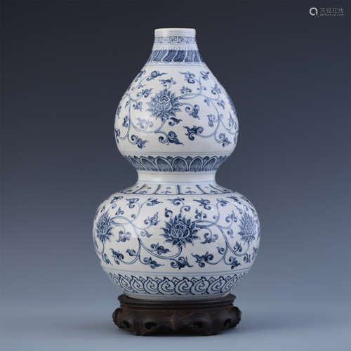 A Chinese Blue and White 'Flower' Double Gourd Vase