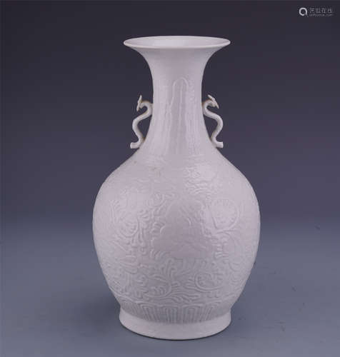 An Exquisite Chinese White-Glazed Carved Bottle Vase with Ruyi Handles