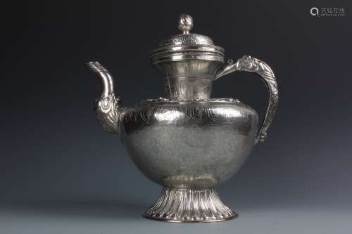 A Chinese Silver Carved Dragon Pattern Teapot