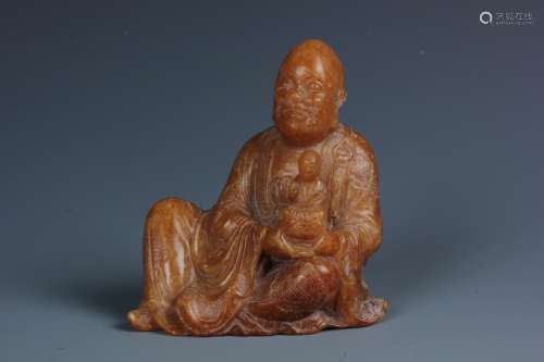 A Chinese Carved Soapstone Buddha