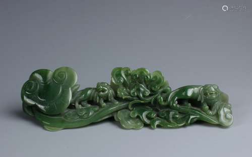 A Chinese Carved Green Jade Brush Rest of Dragon and Lingzhi