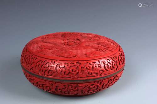 A Chinese Carved Cinnar Red Lacquered Box