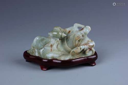 A Chinese Jadeite Carving of  A Recumbent Scholor