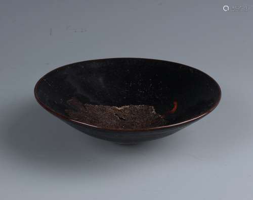 A VERY RARE JIZHOU LEAF-DECORATED CONICAL TEA BOWL