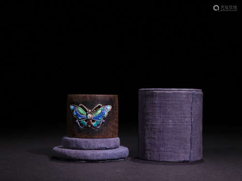 A CHENXIANG WOOD WITH BLUE BUTTERFLY RING