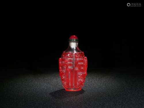 A COLORED GLASS SNUFF BOTTLE WITH CHILONG PATTERNS