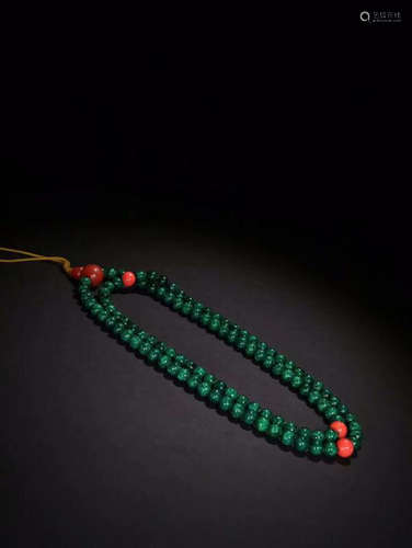 A BRACELET MADE OF 108 WALRUS JIAO BEADS