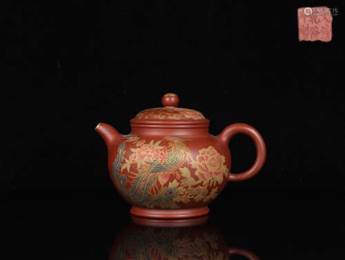 A QIANLONG MARK ZISHA TEAPOT OF PHEONIX PATTERN