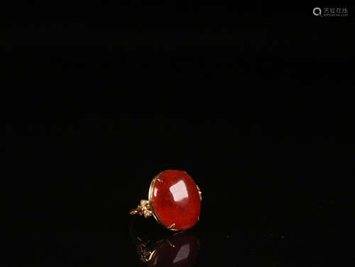 A RED JADEITE RING