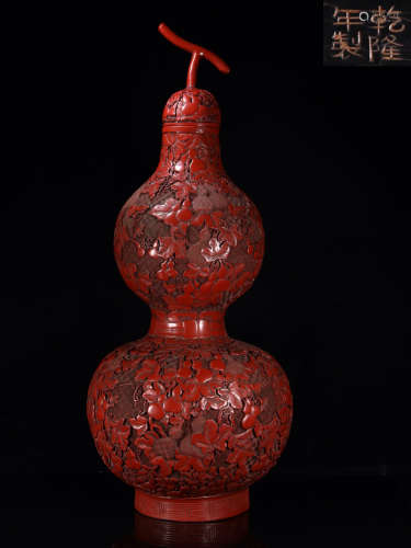 A RRED LACQUER WOOD GOURD VASE