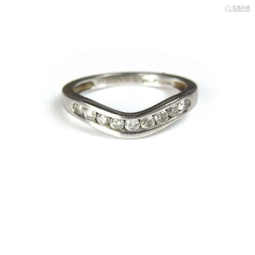 Platinum diamond wishbone ring.