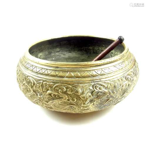 A brass singing bowl.