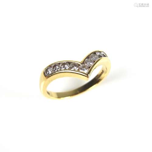 18 ct yellow gold diamond wishbone ring.