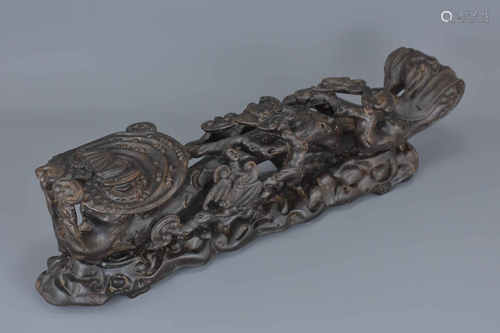 A large Chinese carved hardwood Ruyi sceptre on stand. 46Cm length x 13cm height