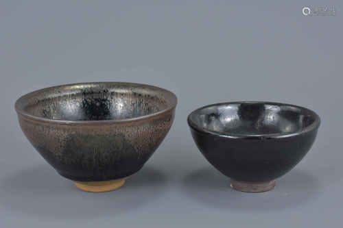 A Chinese oil spot pottery tea bowl together with one other. 13Cm and 10cm diameters. (2)