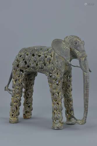 An Eastern bronze sculpture of an elephant. 30Cm tall