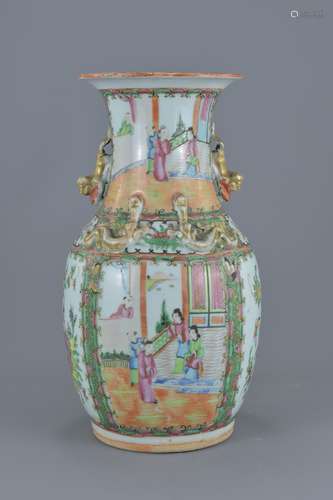 A Chinese Cantonese 19th century famille rose porcelain vase decorated with figures and floral patte