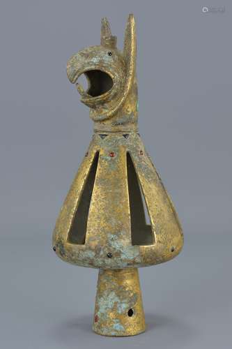 A bronze chariot bell with decorated with phoenix head. 24Cm tall