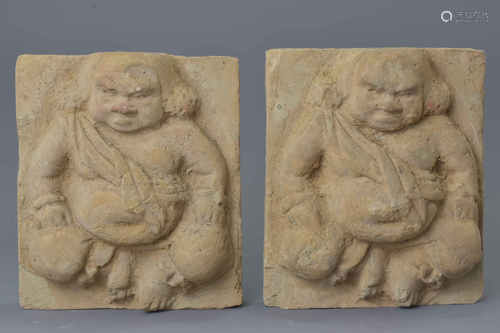 A pair of Chinese pottery tomb tiles carved with guardian figures. Approx. 15Cm x 16cm