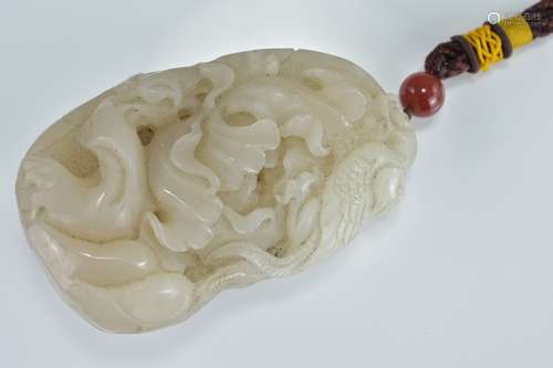 A large Chinese pale jadeite pendant carved as phoenix on mountain. 9Cm x 5cm