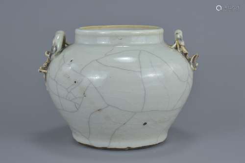 A Chinese 19th century ge yao crackle glaze porcelain jar with twin lizard handles. 14.5cm x 18cm