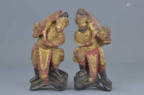 A pair of Chinese carved wooden figures of Gods of Heaven. Gold gilded with red lacquer. 18Cm tall