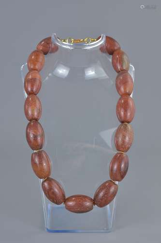 String of 15 Polished Agate Beads, each bead approximately 33mm longs, approximately 47cms long