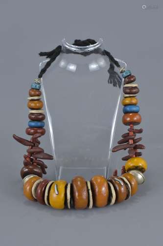 Large Moroccan Silver, Amber resin and Shells in a string necklace. Largest bead 4cm length