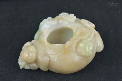 A Chinese jadeite brush washer carved with lion and fruit. 9cm length x 7cm wide.