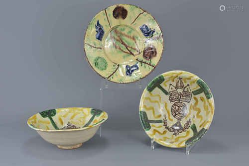 Three Islamic painted pottery bowls. 22 cm – 25 cm diameter.