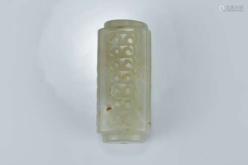 A Chinese carved pale celadon jade kong. Length 5.8cm x 2.5cm wide.