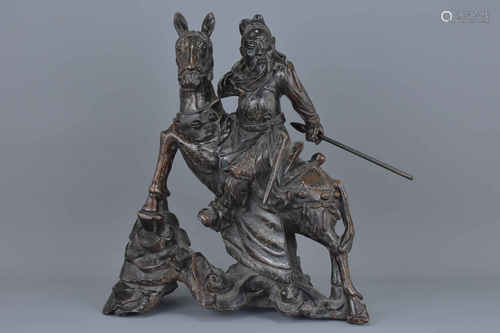 A Chinese carved hardwood figure of Guandi on horse with silver inlay work. 32Cm x 35cm