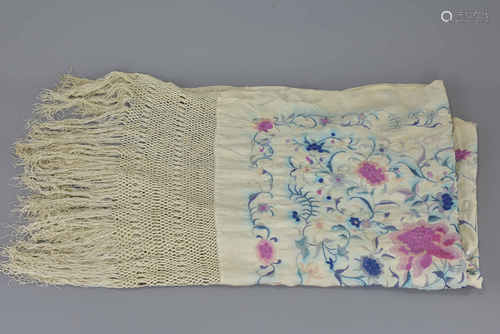 A large antique vintage silk embroidered shawl. Finely embroidered with flowers and a floral border.