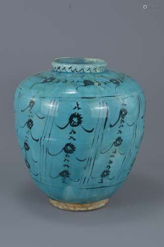 An Islamic 18th/19th century blue-glazed jar. 25 cm tall.