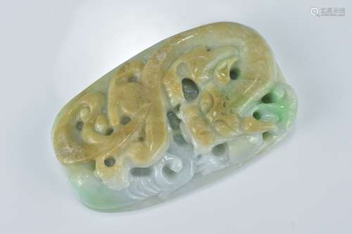 A large Chinese jadeite pendant carved with dragon. 8.5cm x 5cm