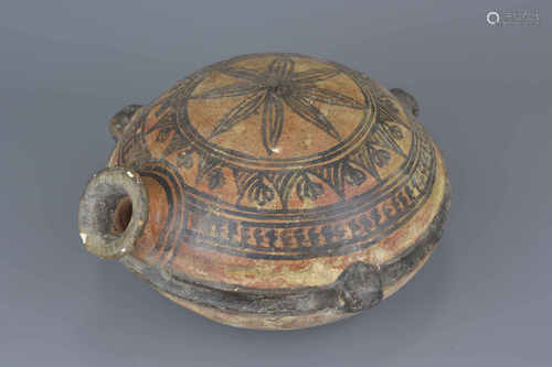 A Neolithic style painted pottery vessel with three looped handles. 24Cm x 15cm