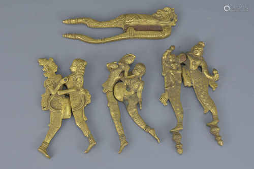 A group of four Indian 19/20th century bronze metal cutters. 16cm length