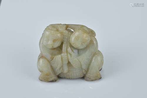 A Chinese celadon jade carving of two boys. 4Cm tall x 5cm width