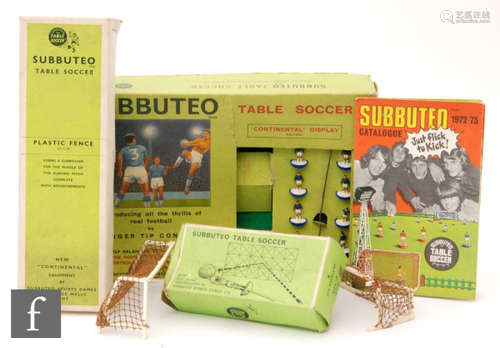 A collection of Subbuteo, comprising C138 England team, 318 Scotland team, three C100 complete teams including 3 and 77, three other teams, incomplete or with some damage, a Continental Display set, a 1972-73 catalogue and a selection of accessories.