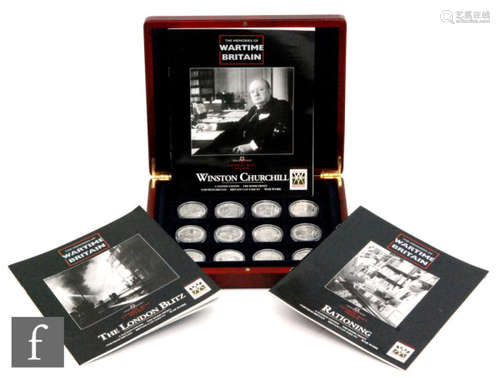 A set of twelve silver proof coins titled Memories of Wartime Britain, with booklets, cased (12)