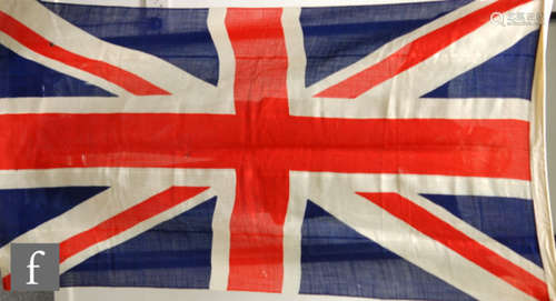 A Union Jack linen flag, 123cm x 63cm and a similar flag, S/D. (2)