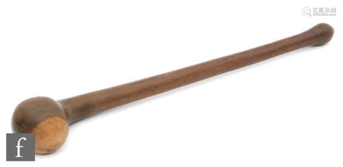 An early 19th Century hardwood African war club or throwing stick, length 43cm.