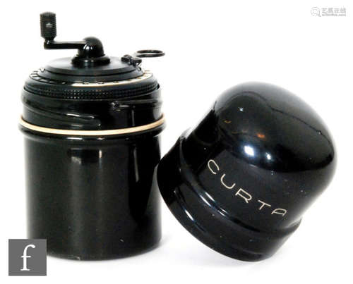 A Curta type II mechanical calculator by Contina Ltd Mauren, Liechtenstein, serial No. 510062, height 11cm, in separate domed case (2)