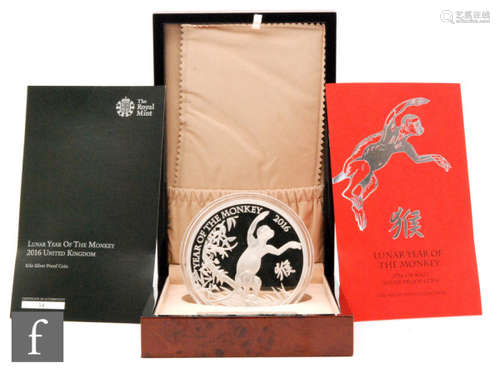 Elizabeth II - A 2017 silver proof kilo coin the commemorate the lunar year of the monkey and another kilo coin for the rooster, with certificates cased. (2)