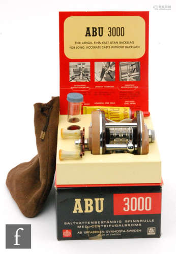 An ABU 3000 salt waterproof bait casting reel in unused condition with instruction manual, spanner, oil, drawstring bag etc. in original box.